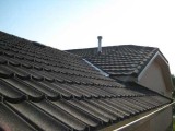 Steel shingles covered with stone granules
